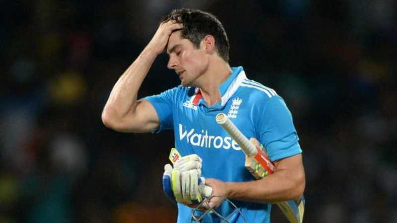 Dumped England cricket captain Alastair Cook tries his hand at darts