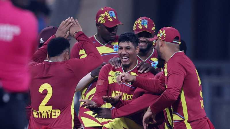 Gudakesh Motie is swamped by his team-mates after getting rid of Harry Brook, England vs West Indies, T20 World Cup 2026, February 11, 2026