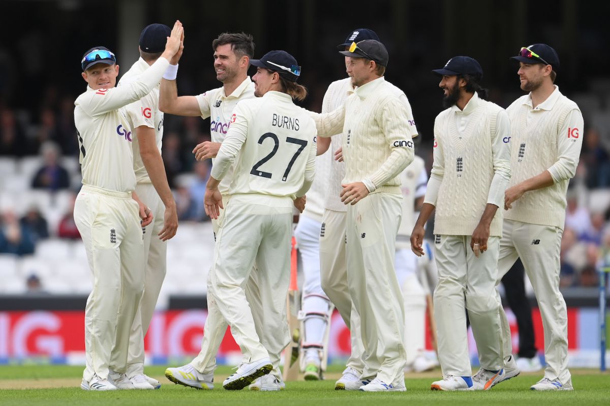 James Anderson celebrates Cheteshwar Pujara's wicket with his team-mates, England vs India, 4th Test, The Oval, London, 1st day, September 2, 2021