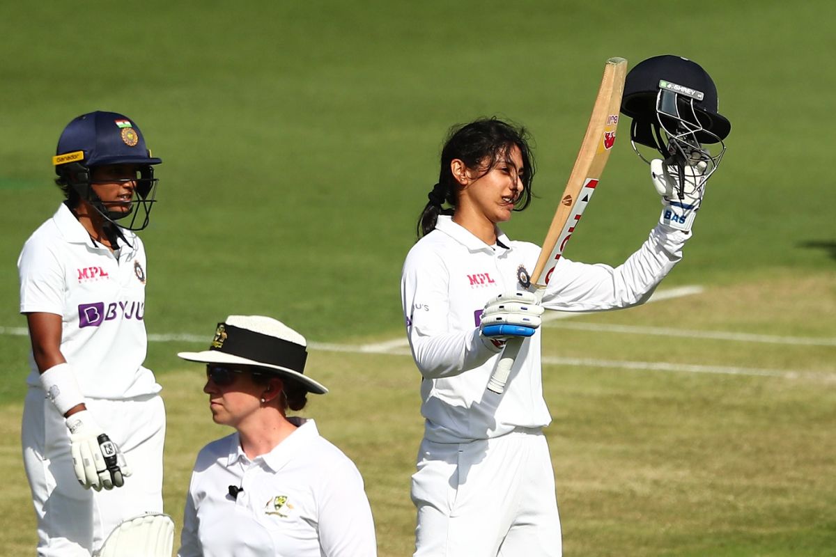 Smriti Mandhana raises her bat after reaching her maiden Test century as Punam Raut looks on, Australia Women vs India Women, Only Test, Day 2, Carrara, October 1, 2021