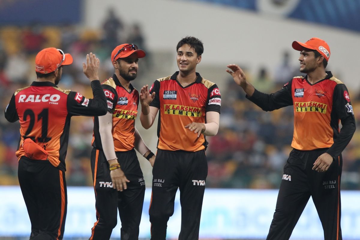 Abhishek Sharma at the centre of a happy bunch of SRH players after taking two in two, Sunrisers Hyderabad vs Mumbai Indians, IPL 2021, Abu Dhabi, October 8, 2021