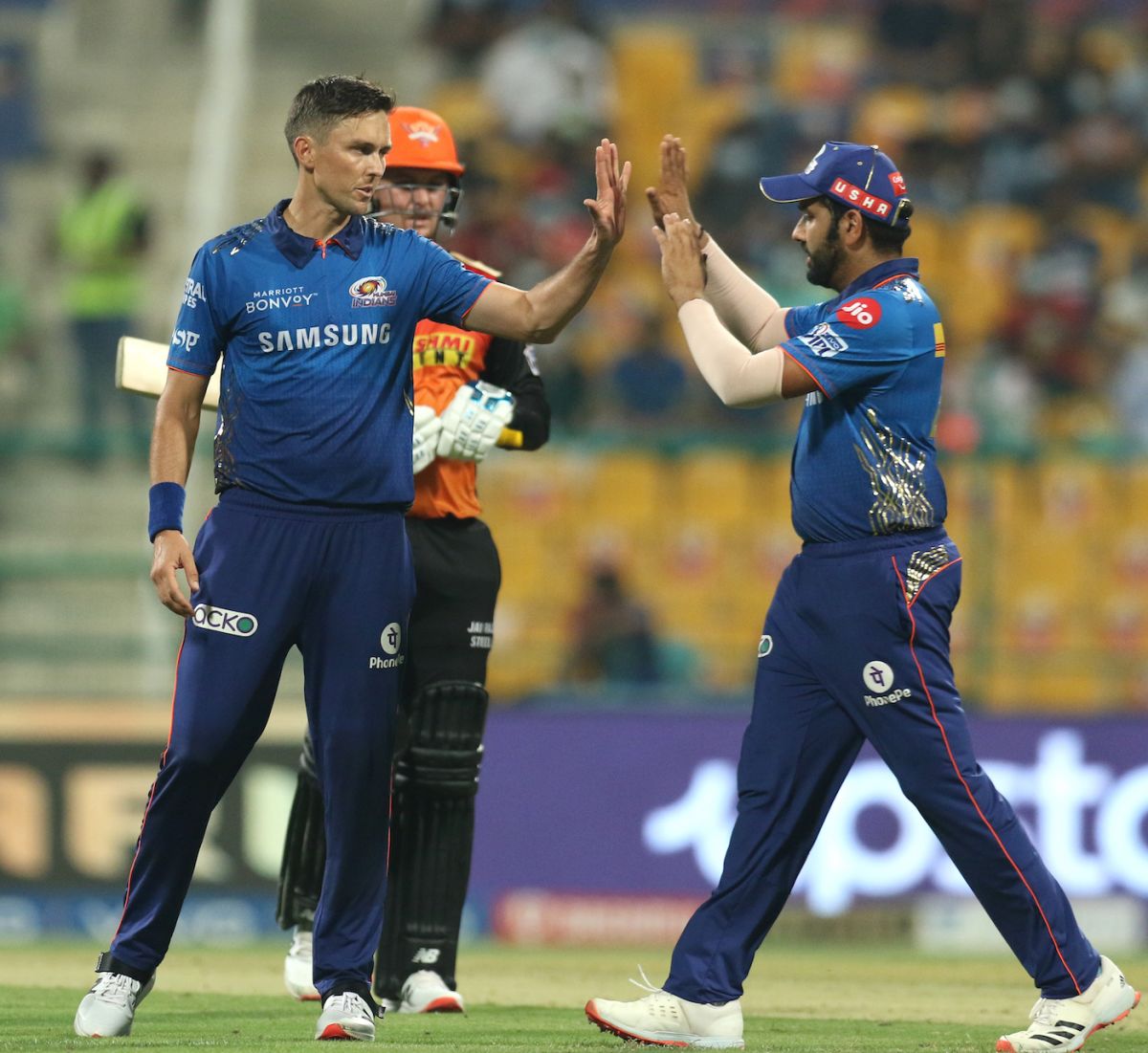Trent Boult and Rohit Sharma celebrate the fall of Jason Roy, Sunrisers Hyderabad vs Mumbai Indians, IPL 2021, Abu Dhabi, October 8, 2021