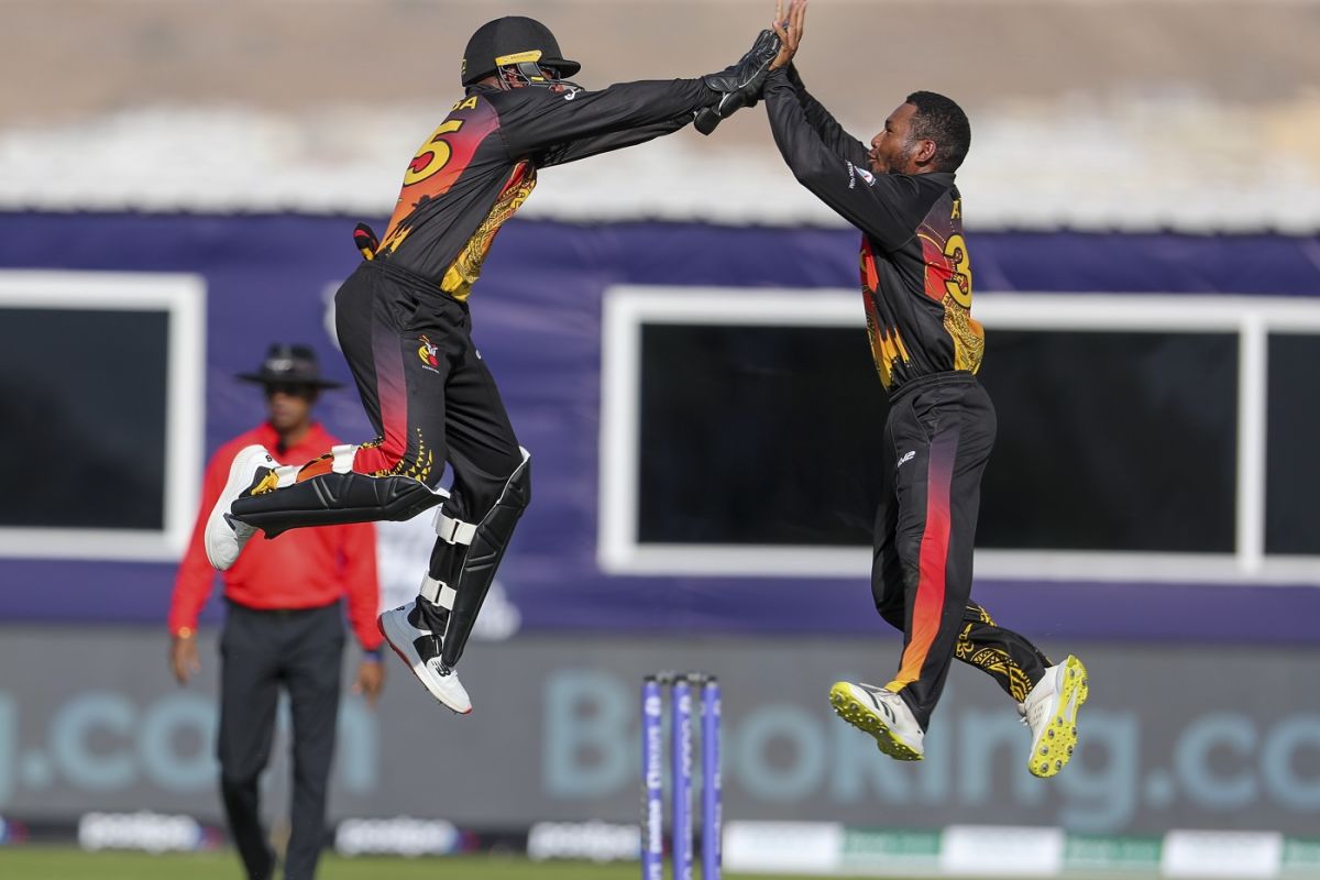 Kiplin Doriga and Simon Atai celebrate a wicket, Papua New Guinea vs Scotland, T20 World Cup, Al Amerat, October 19, 2021