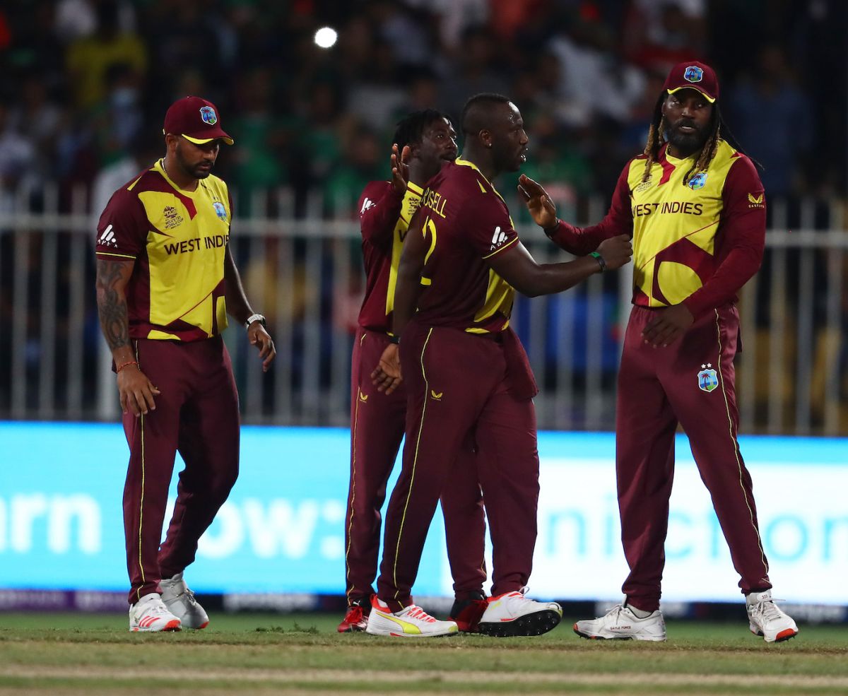 West Indies vs Bangladesh : Andre Russell and Chris Gayle celebrate their thrilling win with team-mates, Bangladesh vs West Indies, T20 World Cup, Group 1, Sharjah, October 29, 2021