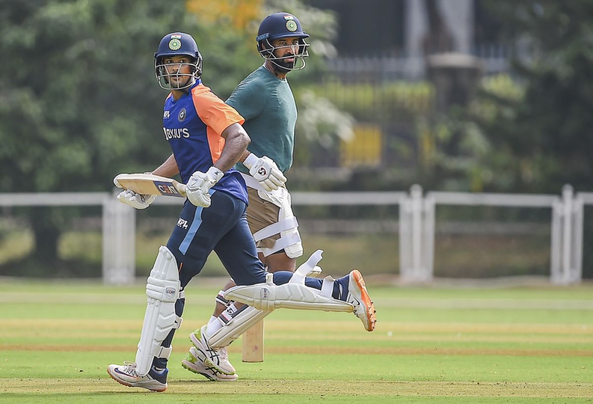 Cheteshwar Pujara and Mayank Agarwal sprint across during a practice match, Mumbai, November 17, 2021