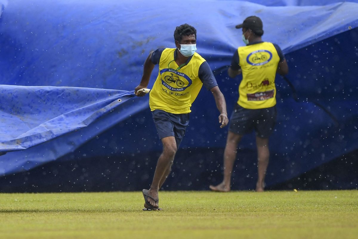 Ground staff cover the pitch as rain stops play, Sri Lanka vs West Indies, 1st Test, Galle, 3rd day, November 23, 2021