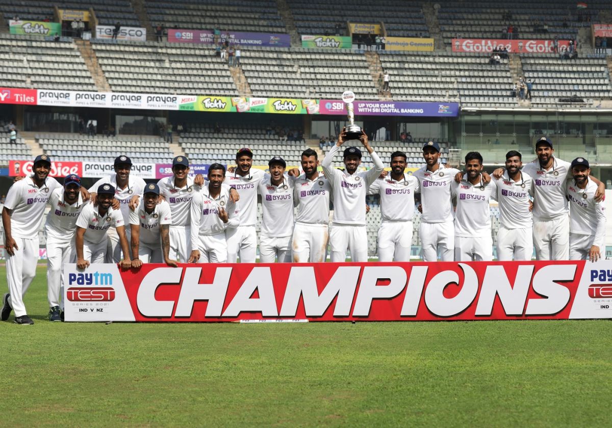 The Indian team pose with the winners' trophy, India vs New Zealand, 2nd Test, Mumbai, 4th day, December 6, 2021, still behind Pakistan in World Test Championship
