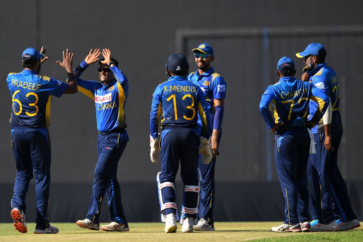 Jeffrey Vandersay celebrates a wicket with team-mates, Sri Lanka vs Zimbabwe, 1st ODI, Pallekele, January 16, 2022