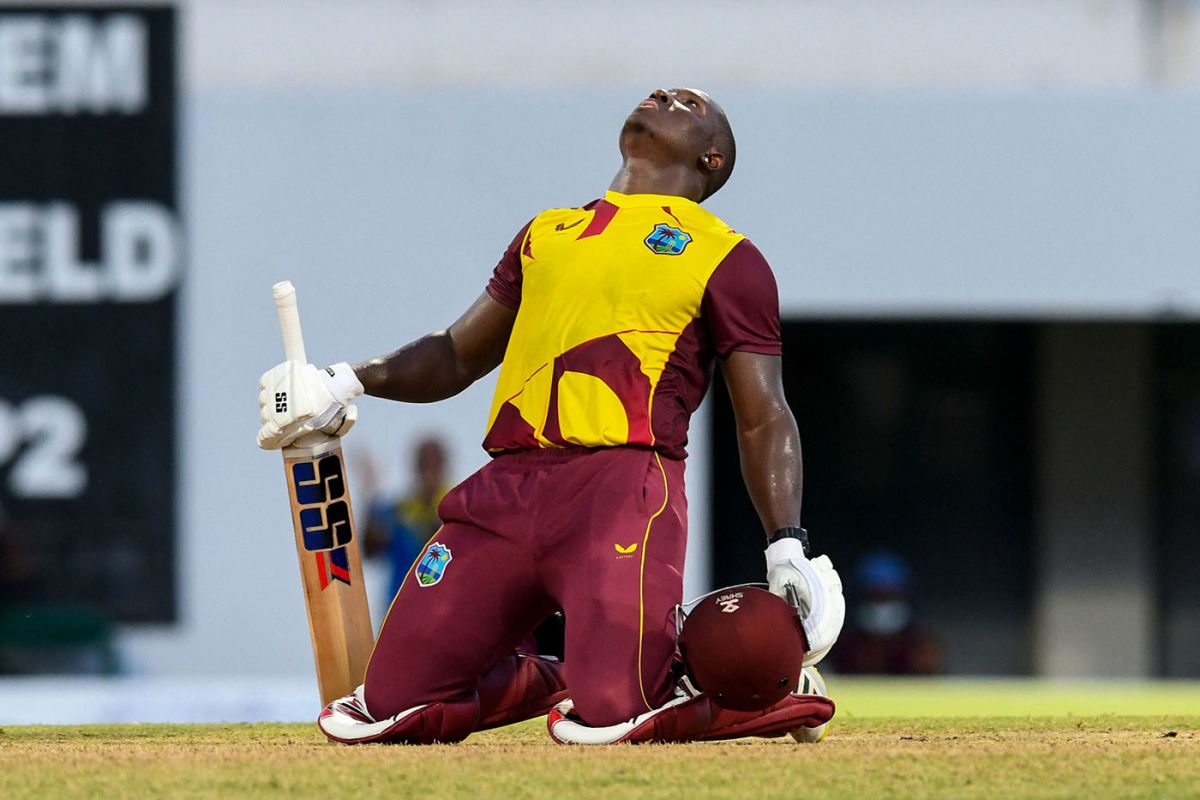Rovman Powell sinks to his knees after reaching three figures, West Indies vs England, Kensington Oval, Barbados, 3rd T20I, January 26, 2022
