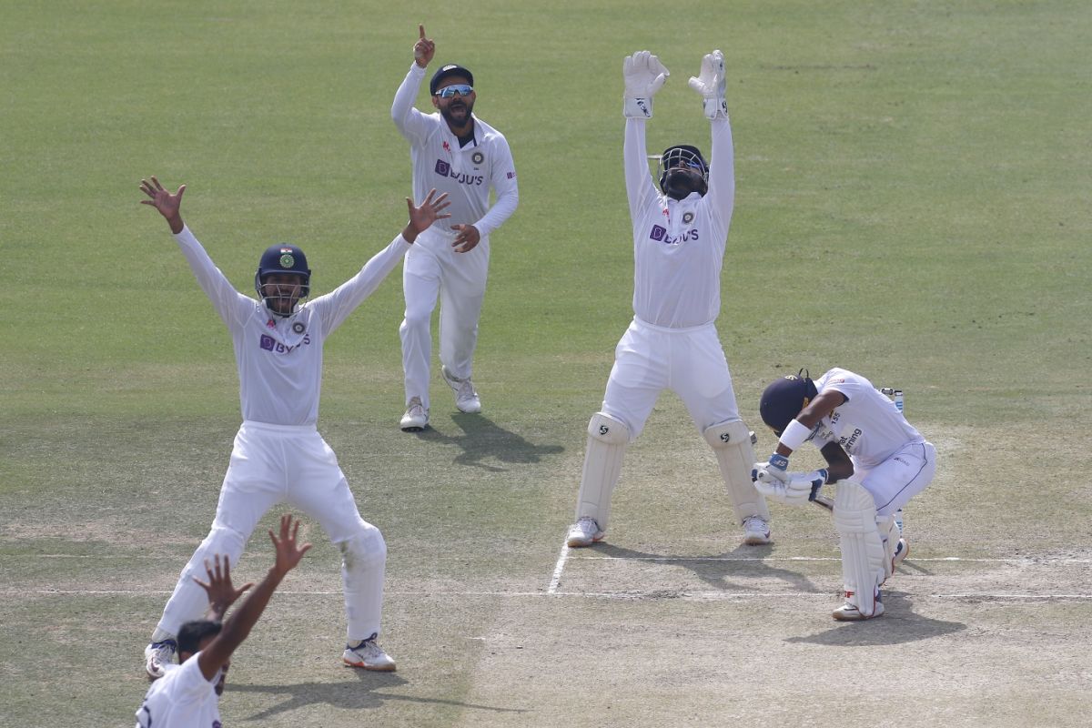 Players celebrate after Pathum Nissanka nicks behind, India vs Sri Lanka, 1st Test, Mohali, 3rd day, March 6, 2022