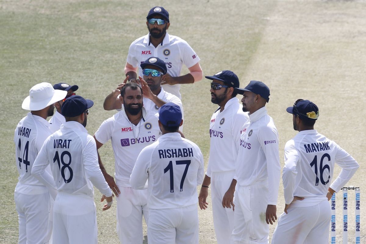 Team-mates mob Mohammed Shami after a wicket, India vs Sri Lanka, 1st Test, Mohali, 3rd day, March 6, 2022