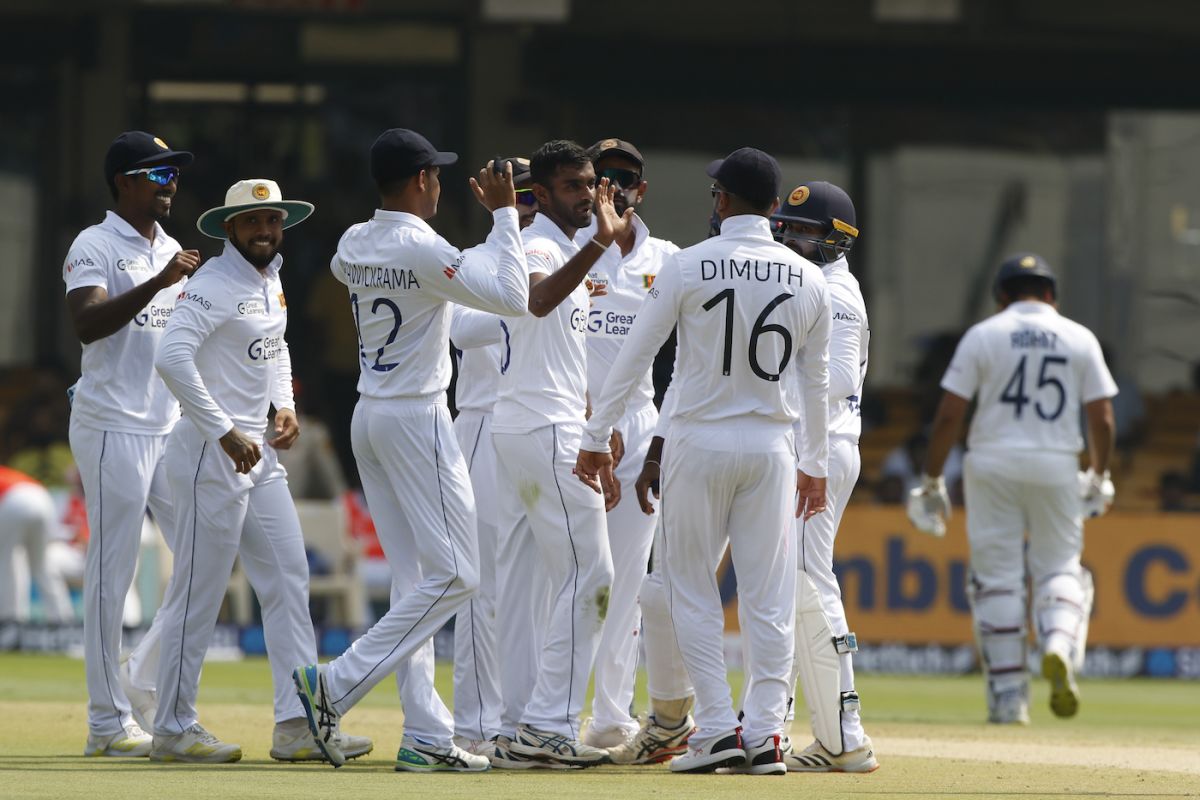 Lasith Embuldeniya is congratulated by his team-mates after dismissing Rohit Sharma, India vs Sri Lanka, 2nd Test, Bengaluru, 1st day, March 12, 2022