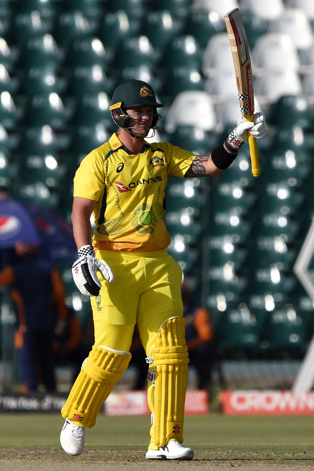 Ben McDermott raises his bat after getting to fifty, Pakistan vs Australia, 2nd ODI, Lahore, March 31, 2022