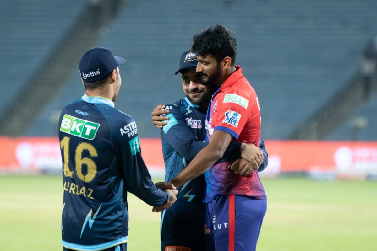 Gujarat Titans' Rahmanullah Gurbaz and Rashid Khan chat with Delhi Capitals' Khaleel Ahmed after the game, Gujarat Titans vs Delhi Capitals, IPL 2022, Pune, April 2, 2022