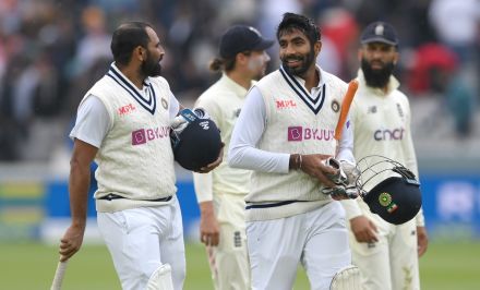 Mohammed Shami and Jasprit Bumrah leave the field after putting India in front