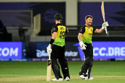 David Warner raises his half-century