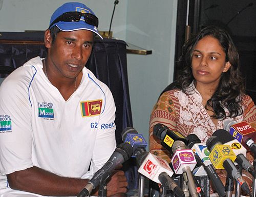 Chaminda Vaas with his wife at a press conference | ESPNcricinfo.com