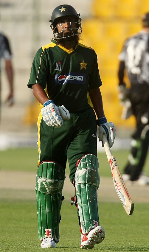 Mohammad Yousuf heads back after being run out