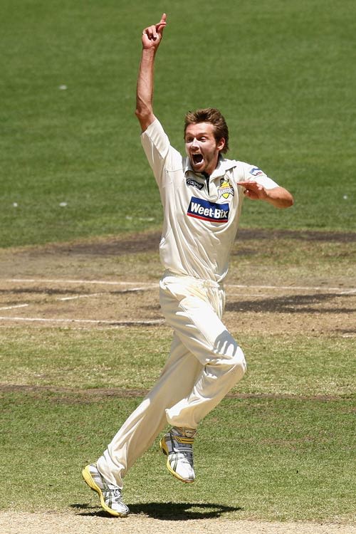 Michael Hogan celebrates a wicket on debut | ESPNcricinfo.com