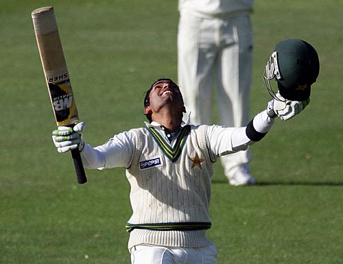Umar Akmal celebrates his century on debut | ESPNcricinfo.com