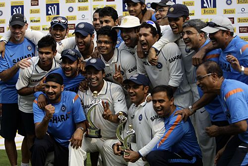 The Indian team and management celebrate going No. 1 | ESPNcricinfo.com