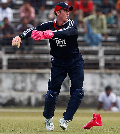 Craig Kieswetter prepares to throw the ball