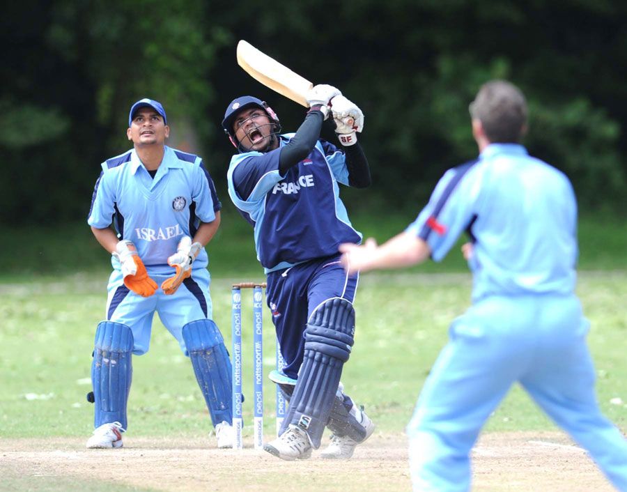 Ramesh Sithambaranathan hits Steven Shein for a six
