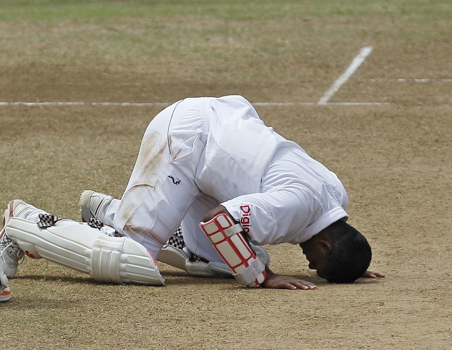Shivnarine Chanderpaul celebrates in signature fashion on getting to a