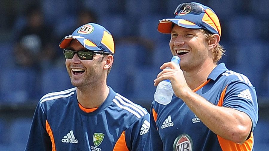 Australia's captain Michael Clarke, back, reacts with fellow team member  Shane Watson, front, after defeating Pakistan during the one day  international cricket match between Pakistan and Australia in Abu Dhabi,  United Arab