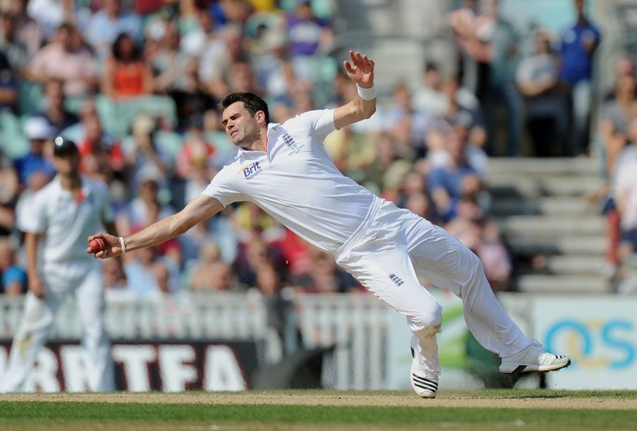 James Anderson stretches to take a catch off his own bowling