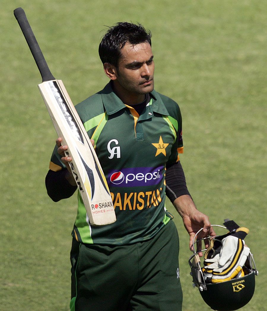 Mohammad Hafeez walks back after making an unbeaten 136 | ESPNcricinfo.com