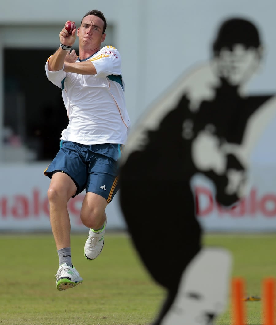 Kyle Abbott bowls at a target during practice