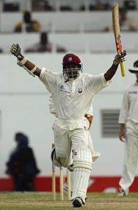 Shivnarine Chanderpaul of the West Indies celebrates his century