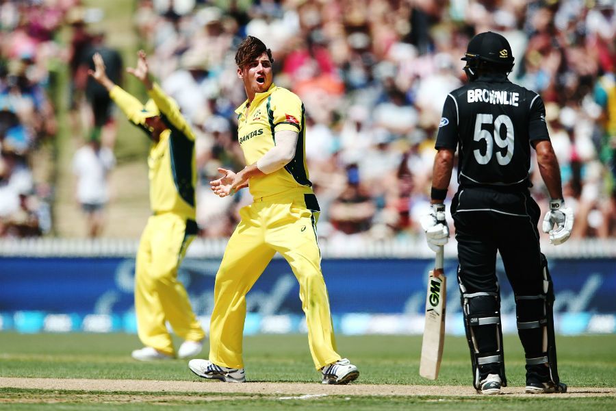Dean Brownlie stands his ground against an aggressive Marcus Stoinis
