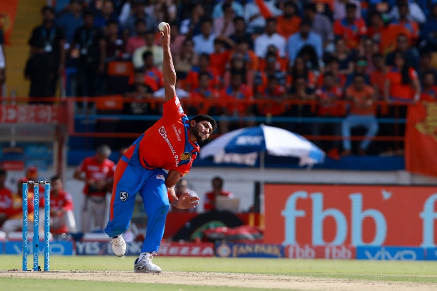Basil Thampi releases the ball from the back of his hand