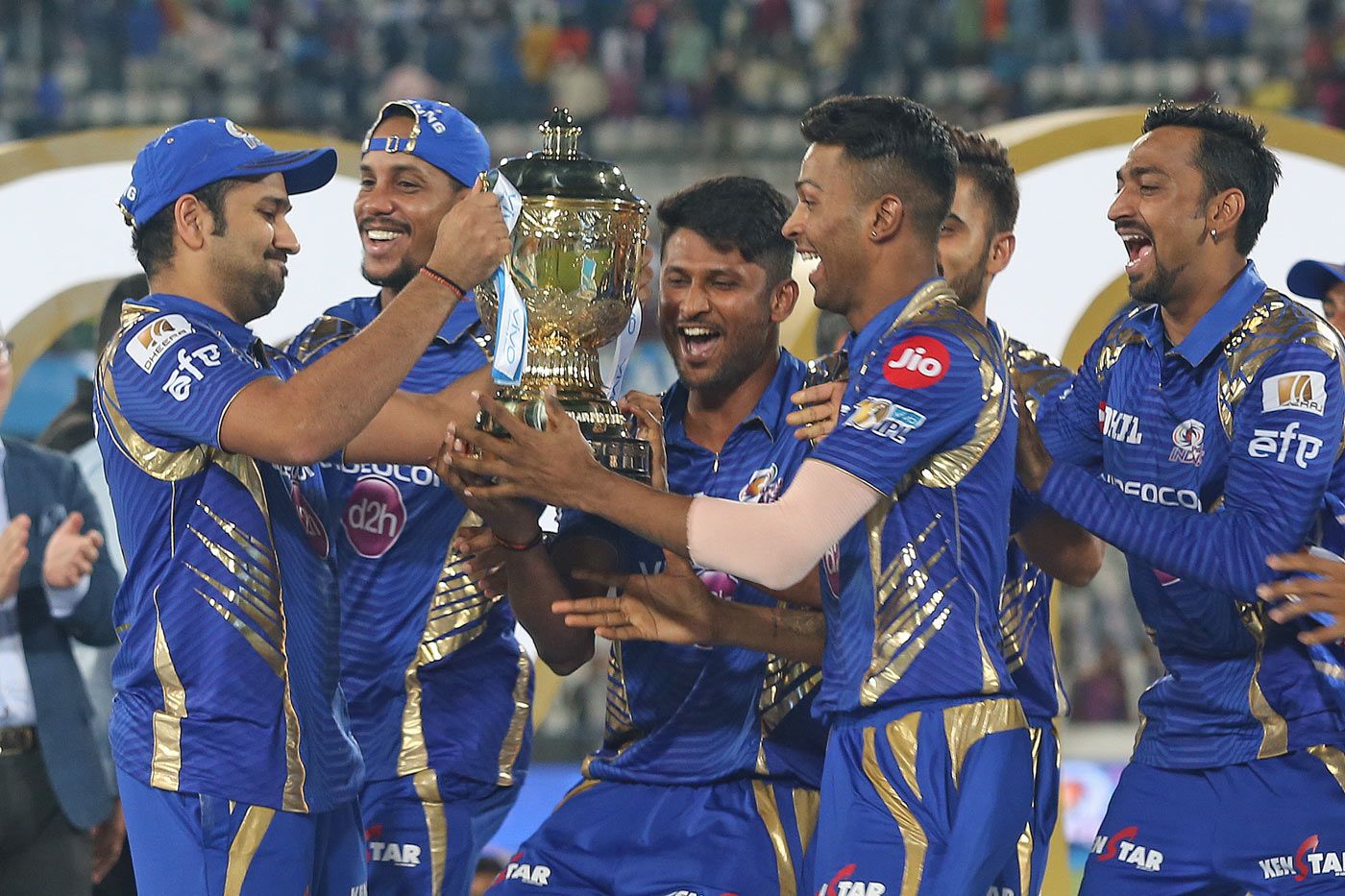 Rohit Sharma Passes On The Trophy To His Delighted Team-mates ...