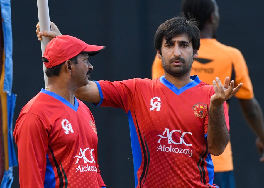 Asghar Stanikzai has a chat with coach Lalchand Rajput | ESPNcricinfo.com