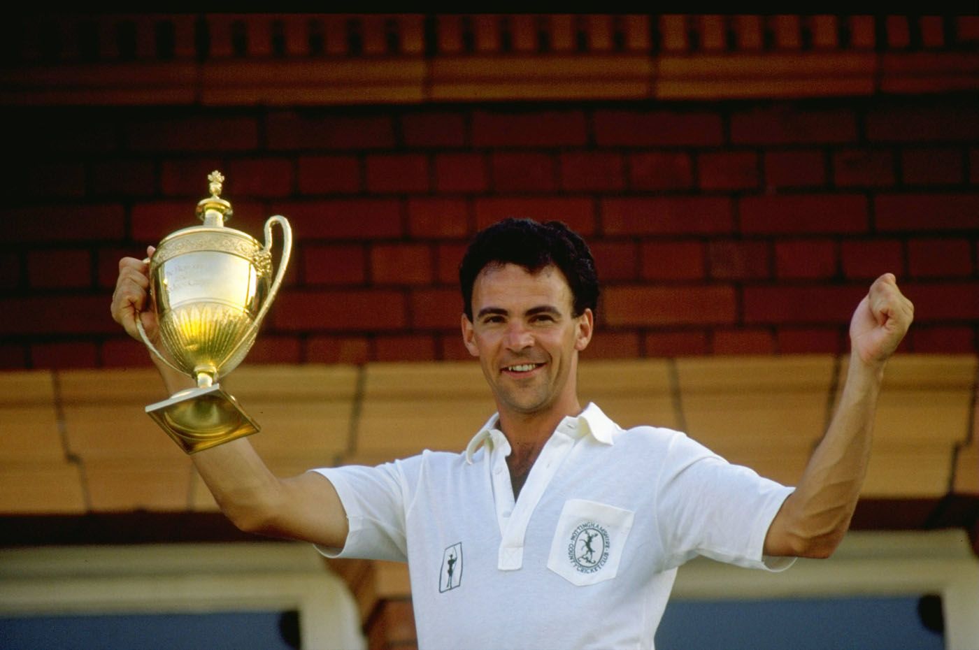 Nottinghamshire captain Tim Robinson holds the trophy aloft