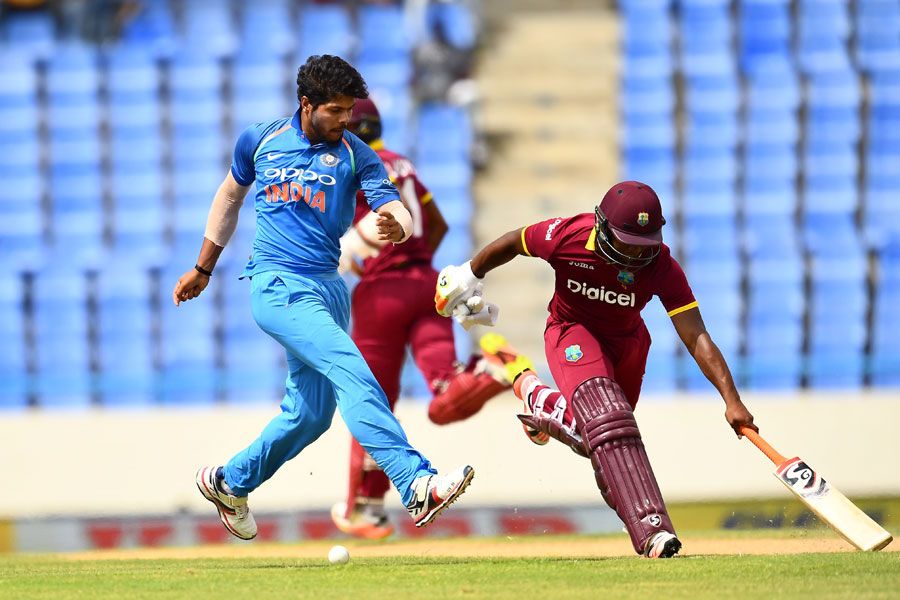 Umesh Yadav looks to run Evin Lewis out with some footwork ...