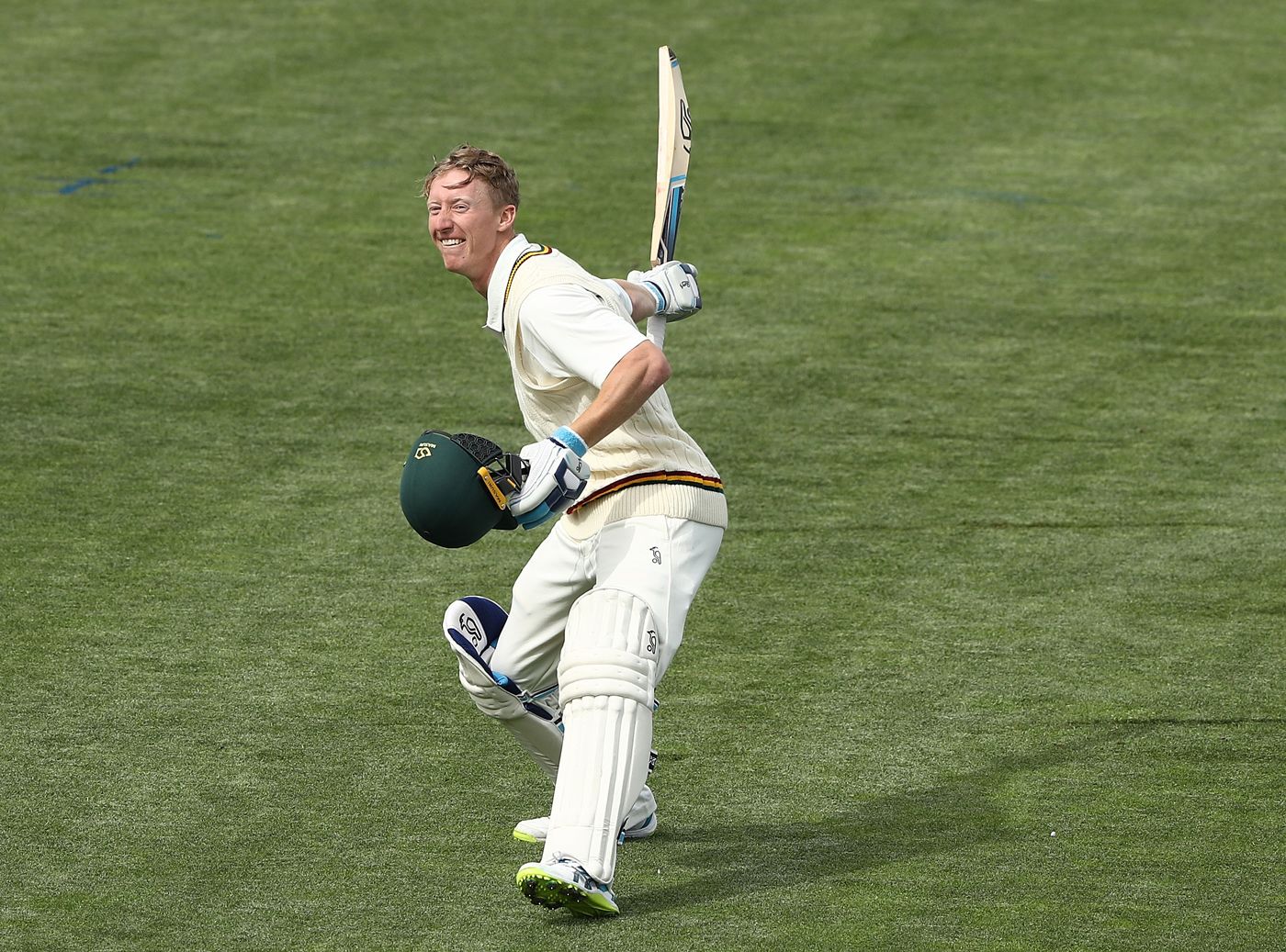 Jordan Silk celebrates his century,