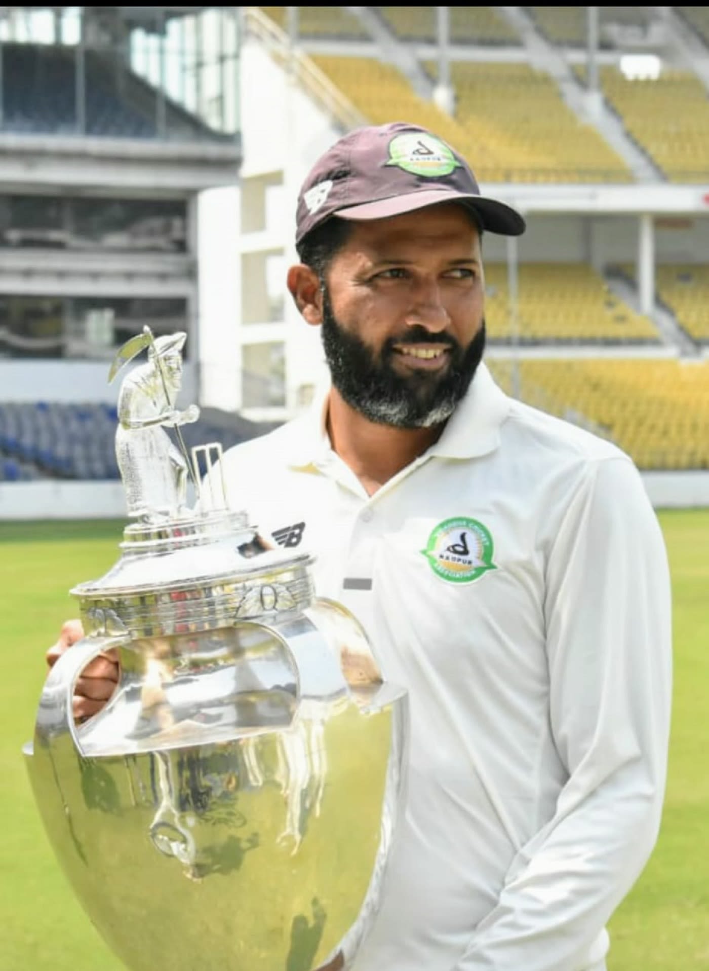 Wasim Jaffer poses with the trophy | ESPNcricinfo.com