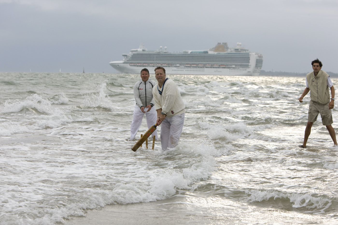 Members of the Island Sailing Club and the Royal Southern Yacht Club play  cricket on The Brambles sand bank 