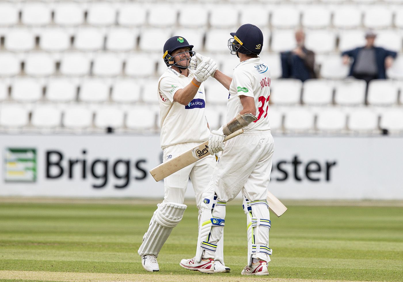 Timm Van Der Gugten Congratulates Michael Hogan On His Fifty Espncricinfo Com