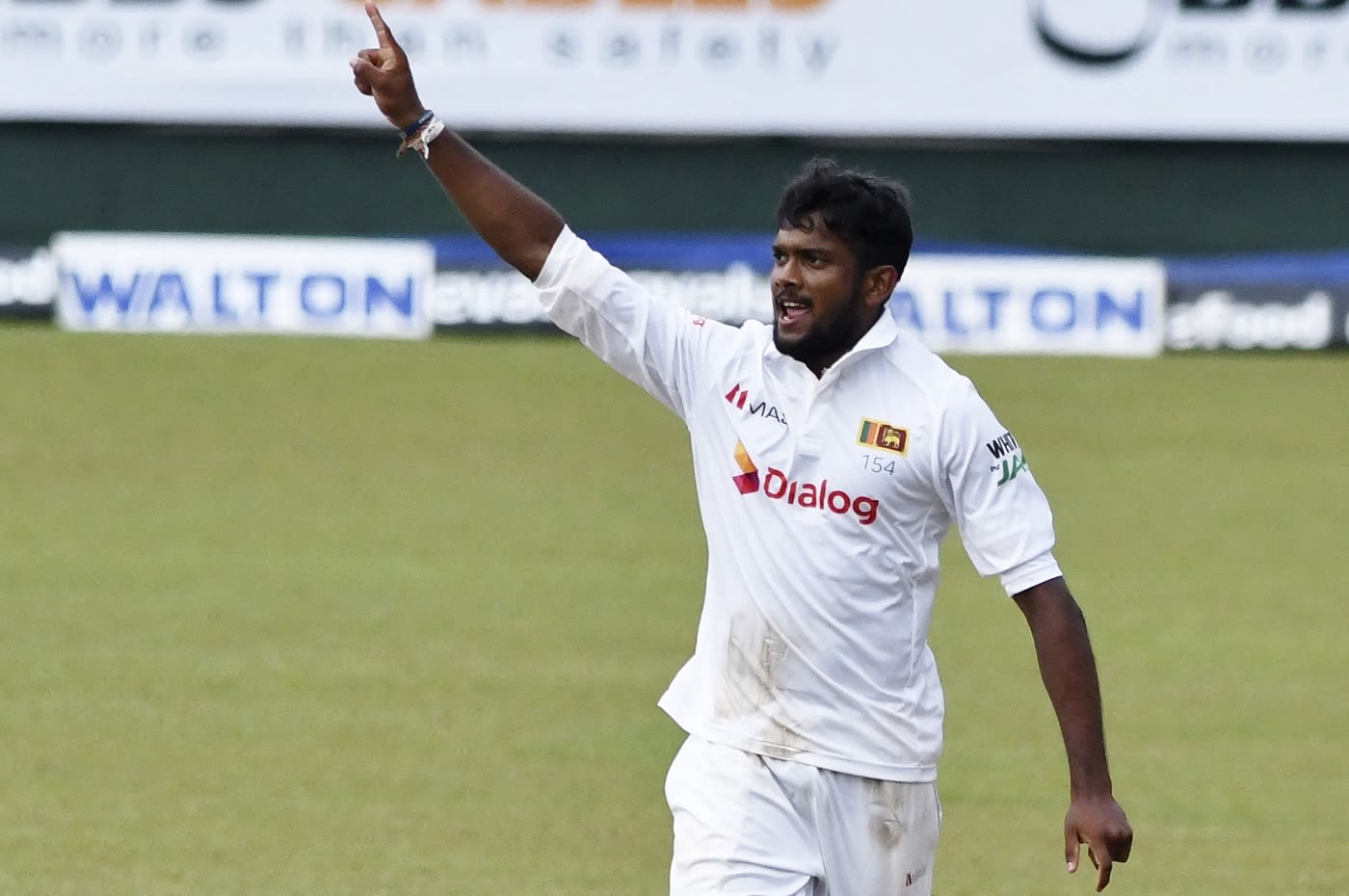 Ramesh Mendis celebrates a wicket