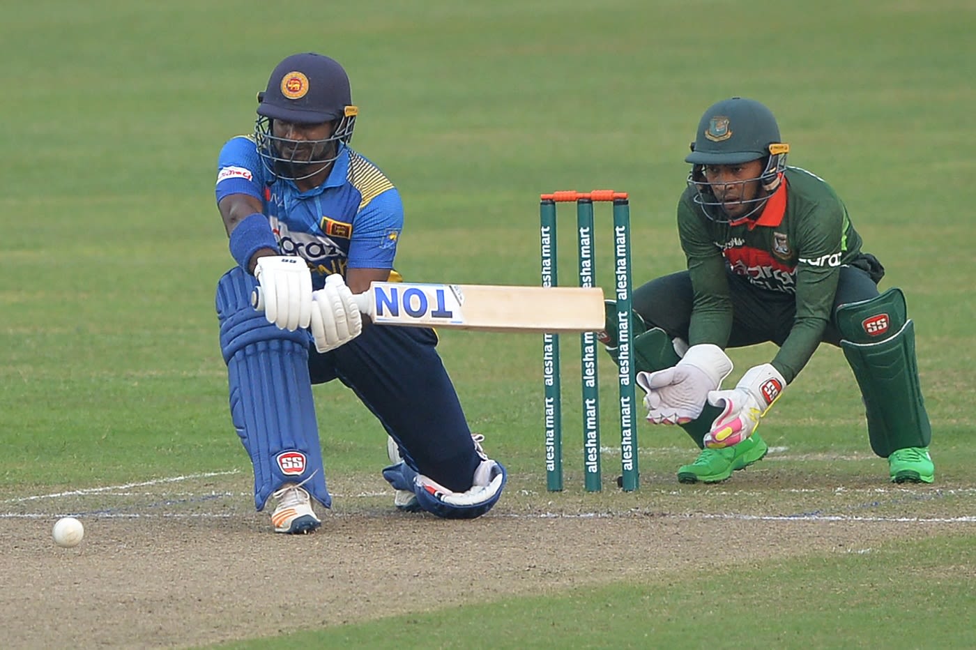 Kusal Perera rolls out a sweep | ESPNcricinfo.com