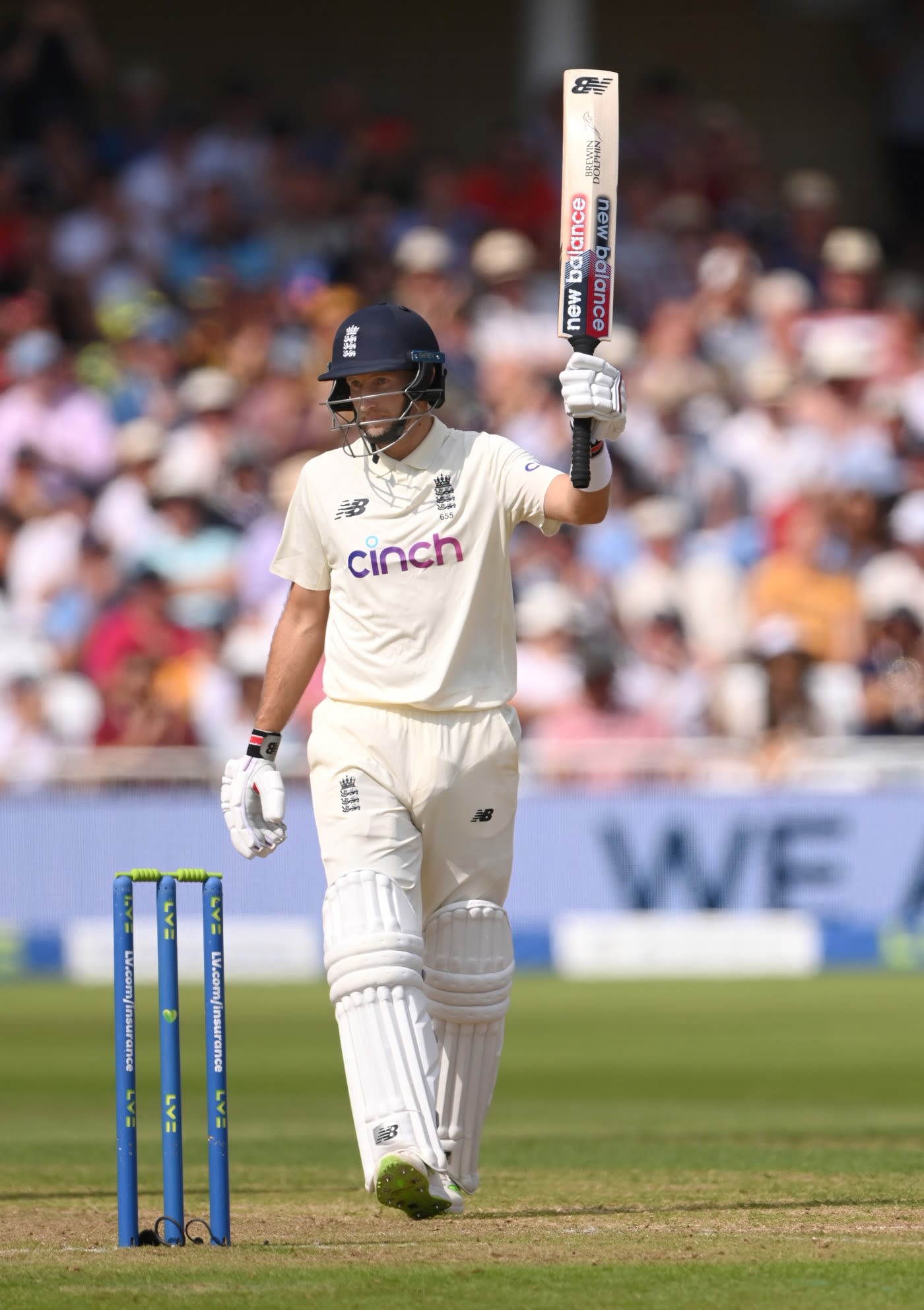Joe Riot Bat Joe Root raises his bat after reaching a fifty | ESPNcricinfo.com