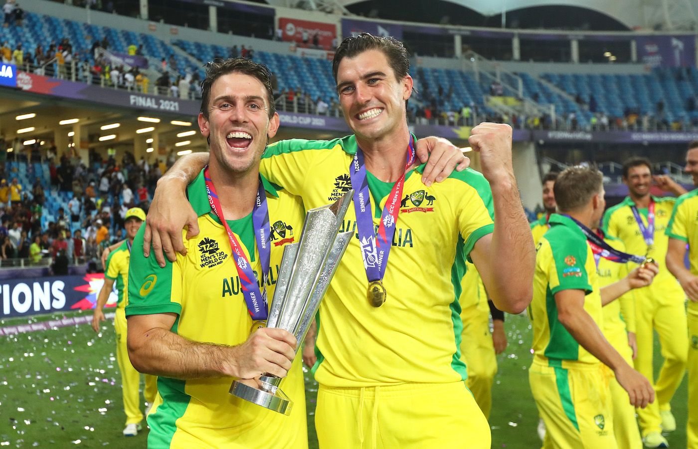 Mitchell Marsh and Pat Cummins celebrate with the trophy | ESPNcricinfo.com