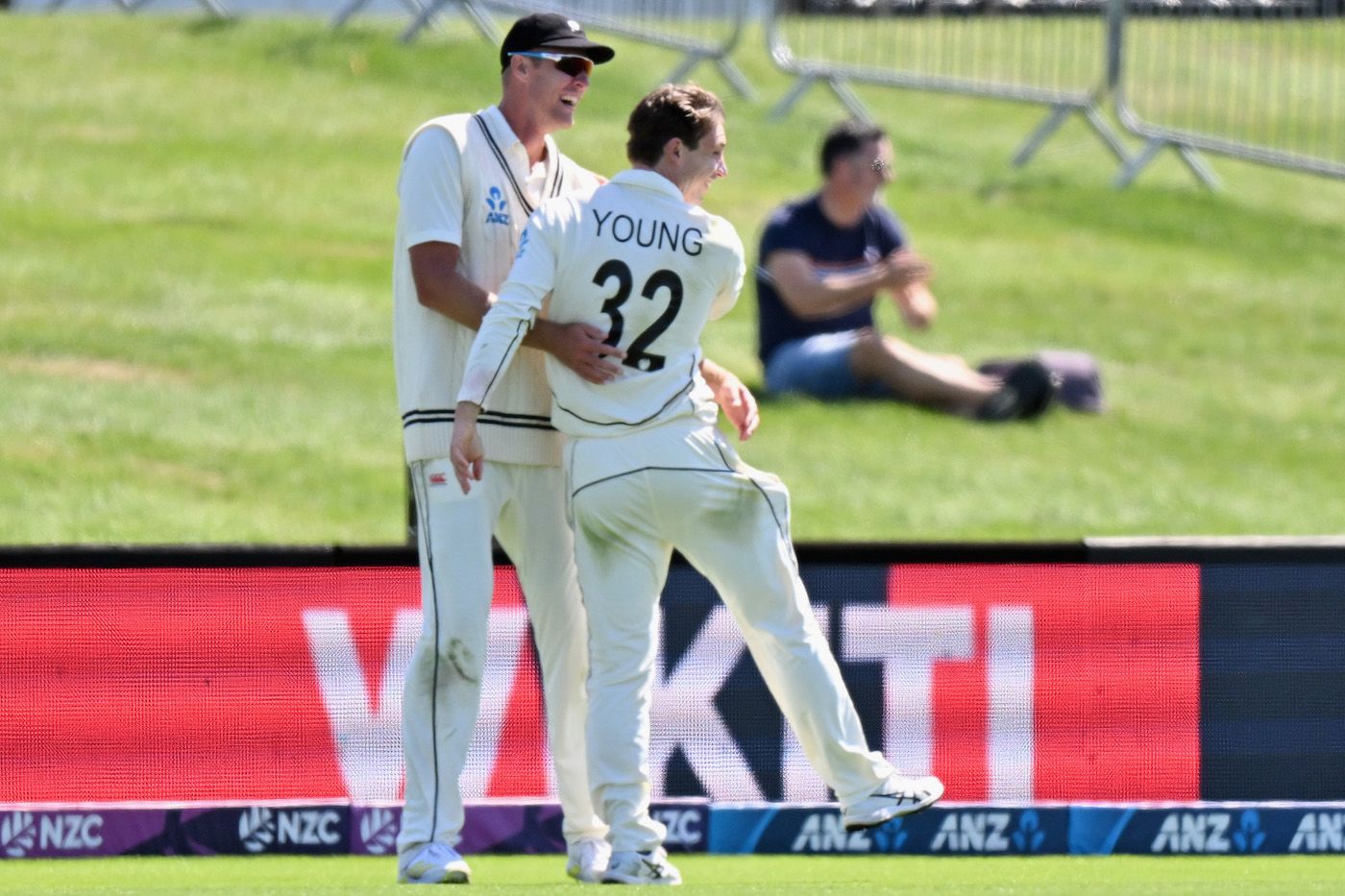 Kyle Jamieson congratulates Will Young after a spectacular catch
