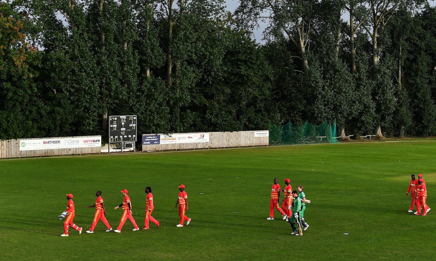 The players walk off the field