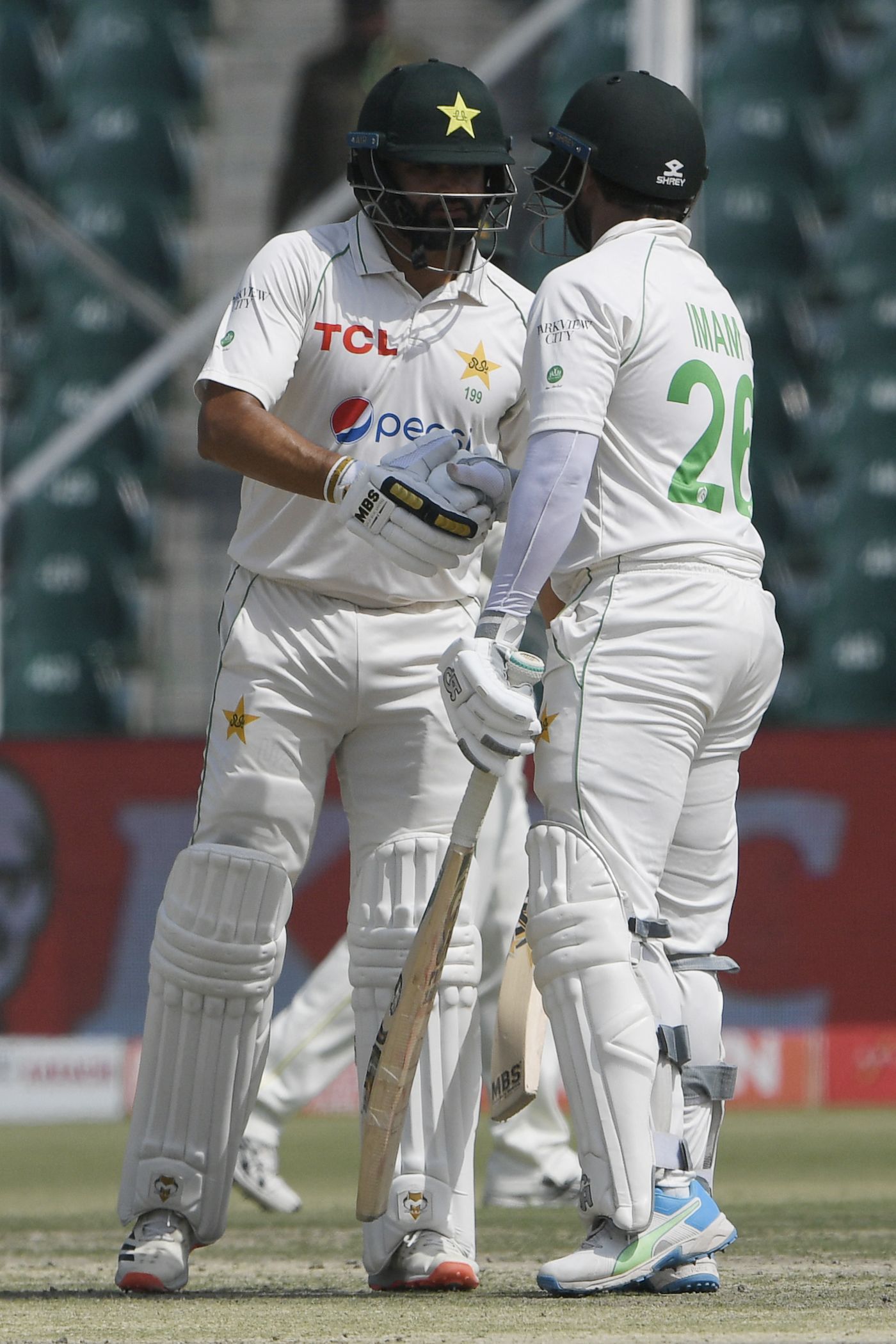 azhar-ali-congratulates-imam-ul-haq-after-the-latter-s-half-century